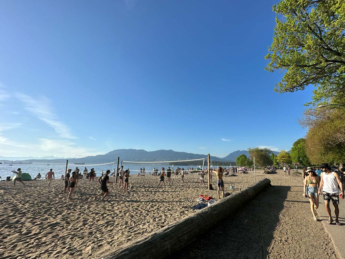 Beach volleyball courts and walking path at Kitsilano Beach.