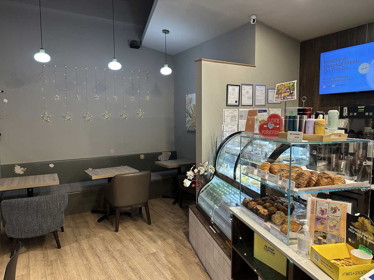 Pastry counter and seating area inside Blenz on Robson st.