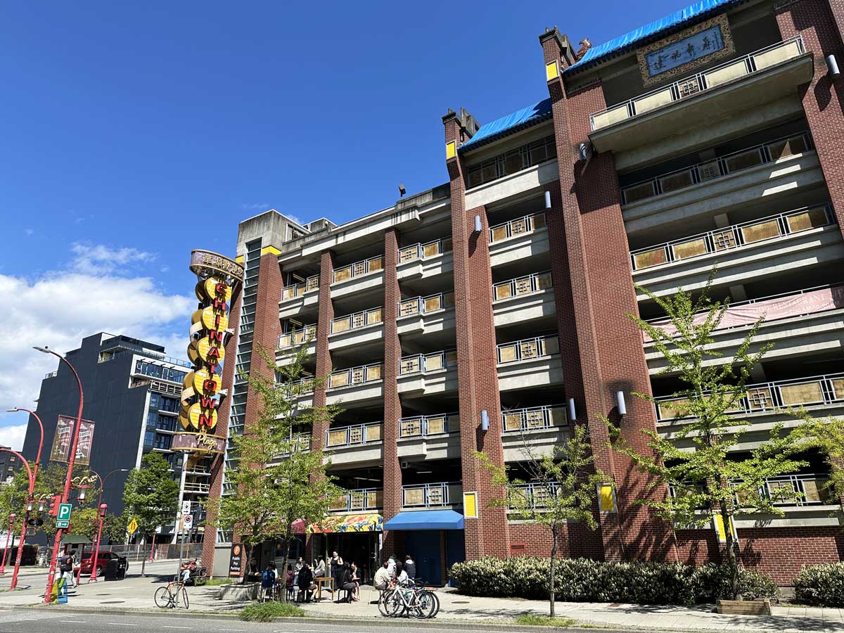 Chinatown Plaza sign and multi-level parking building.