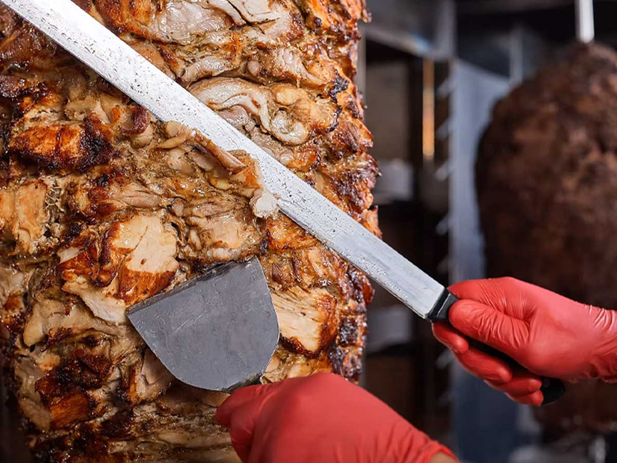 Juicy Chicken Donair Being Carved at Donair Master.
