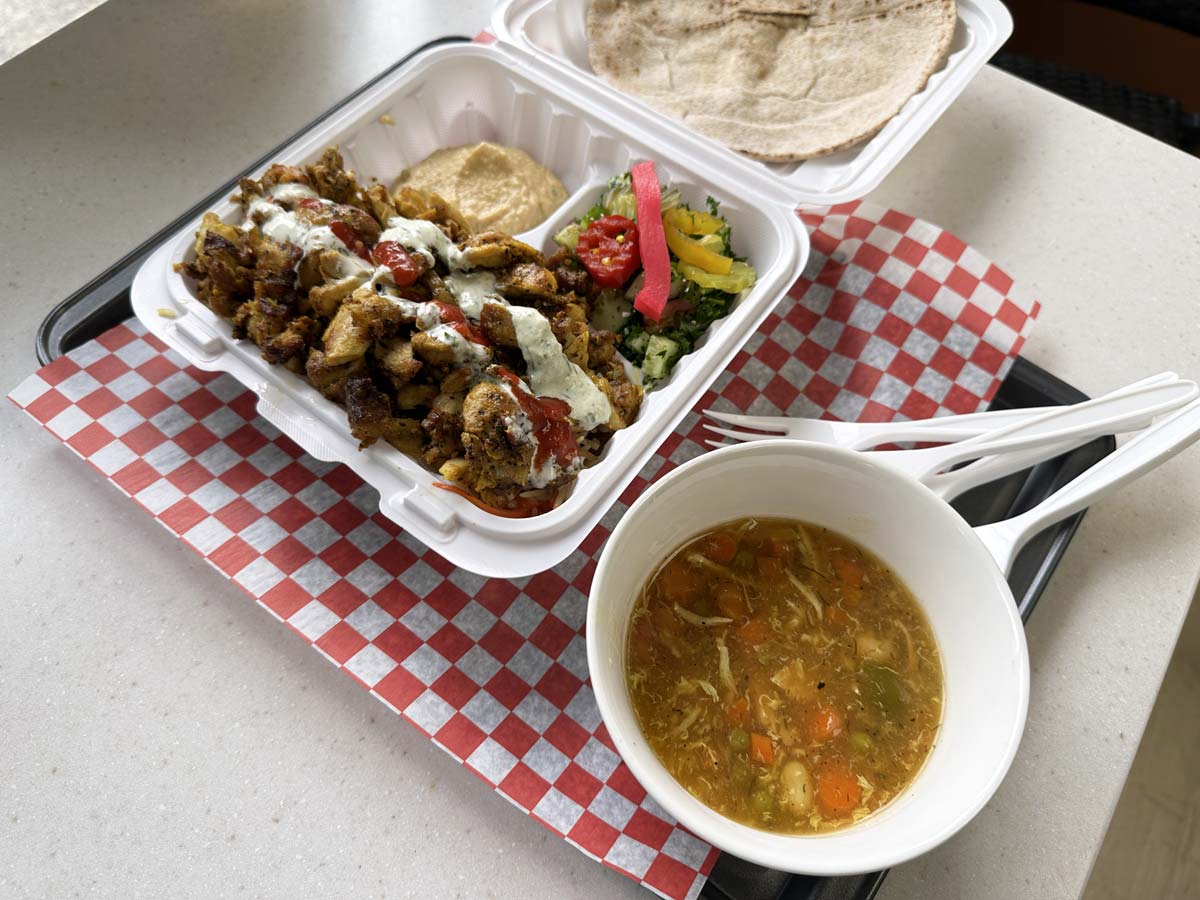 Chicken Platter with Hummus, Pita, Salad, and Soup at Donair Master.