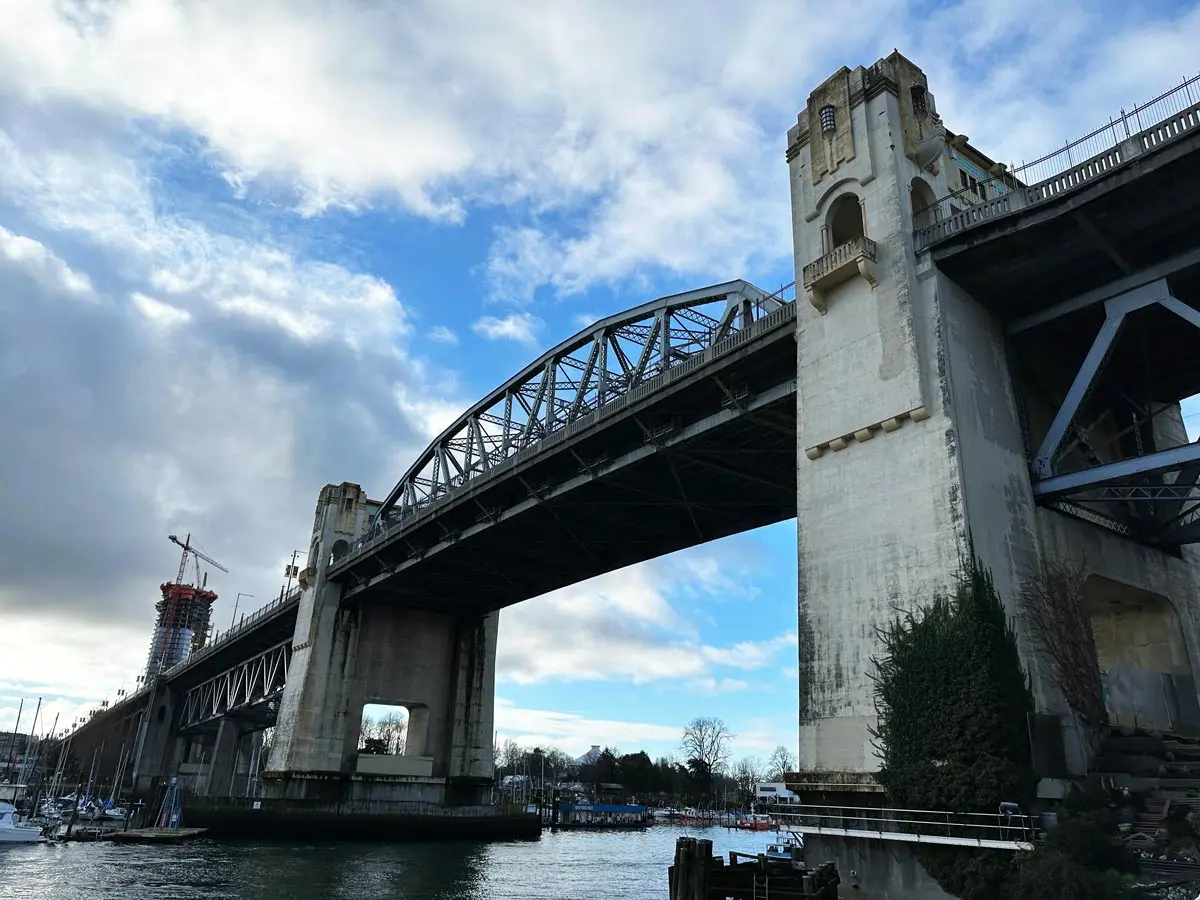 Burrard Bridge with Art Deco towers and False Creek view.