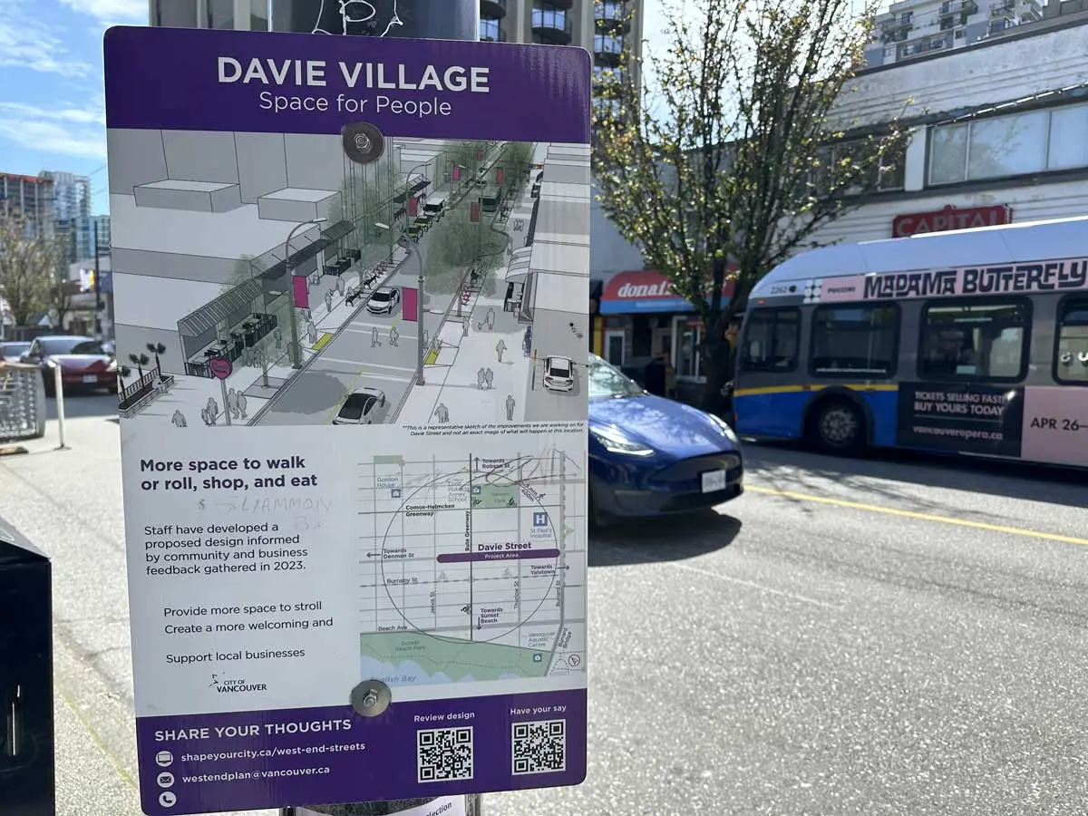 Sign showing Davie Village street redesign plan to create more pedestrian space in Vancouver.