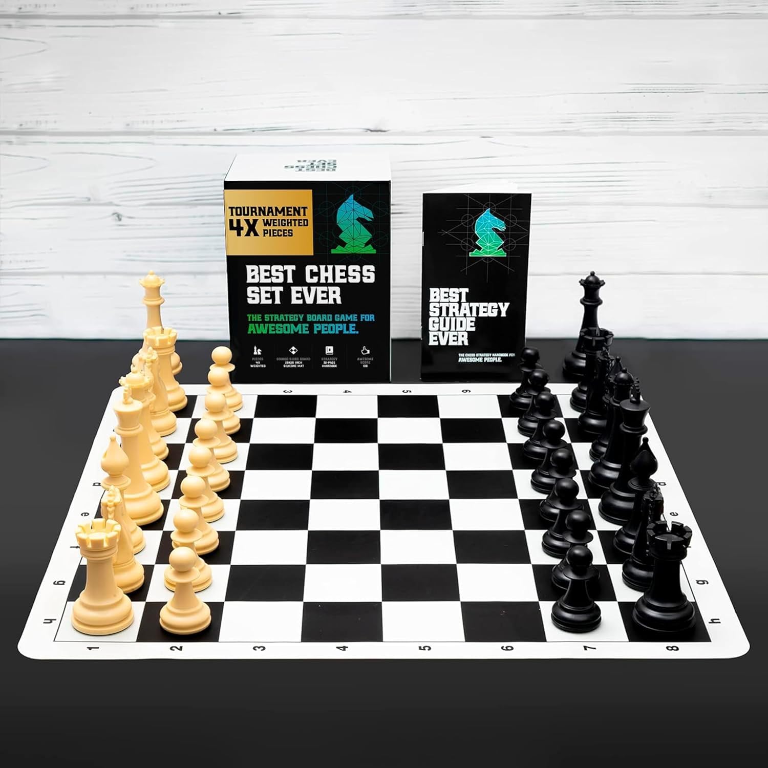 Chess Set Displayed with Strategy Guide and Packaging.