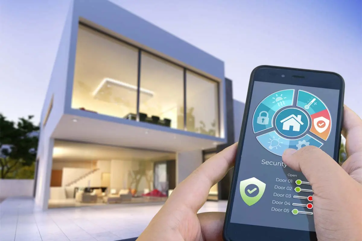 Smartphone displaying home security settings in front of a modern house.