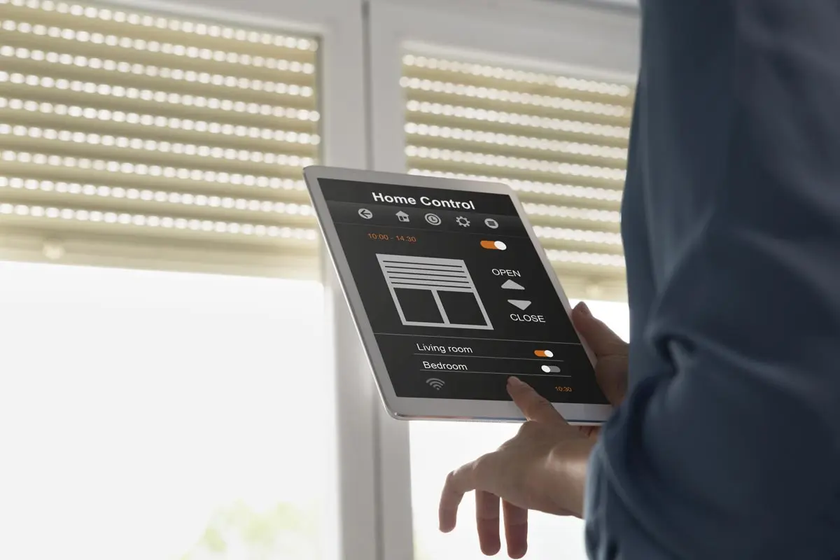 Controlling automated blinds and shades using a tablet with a home control interface.